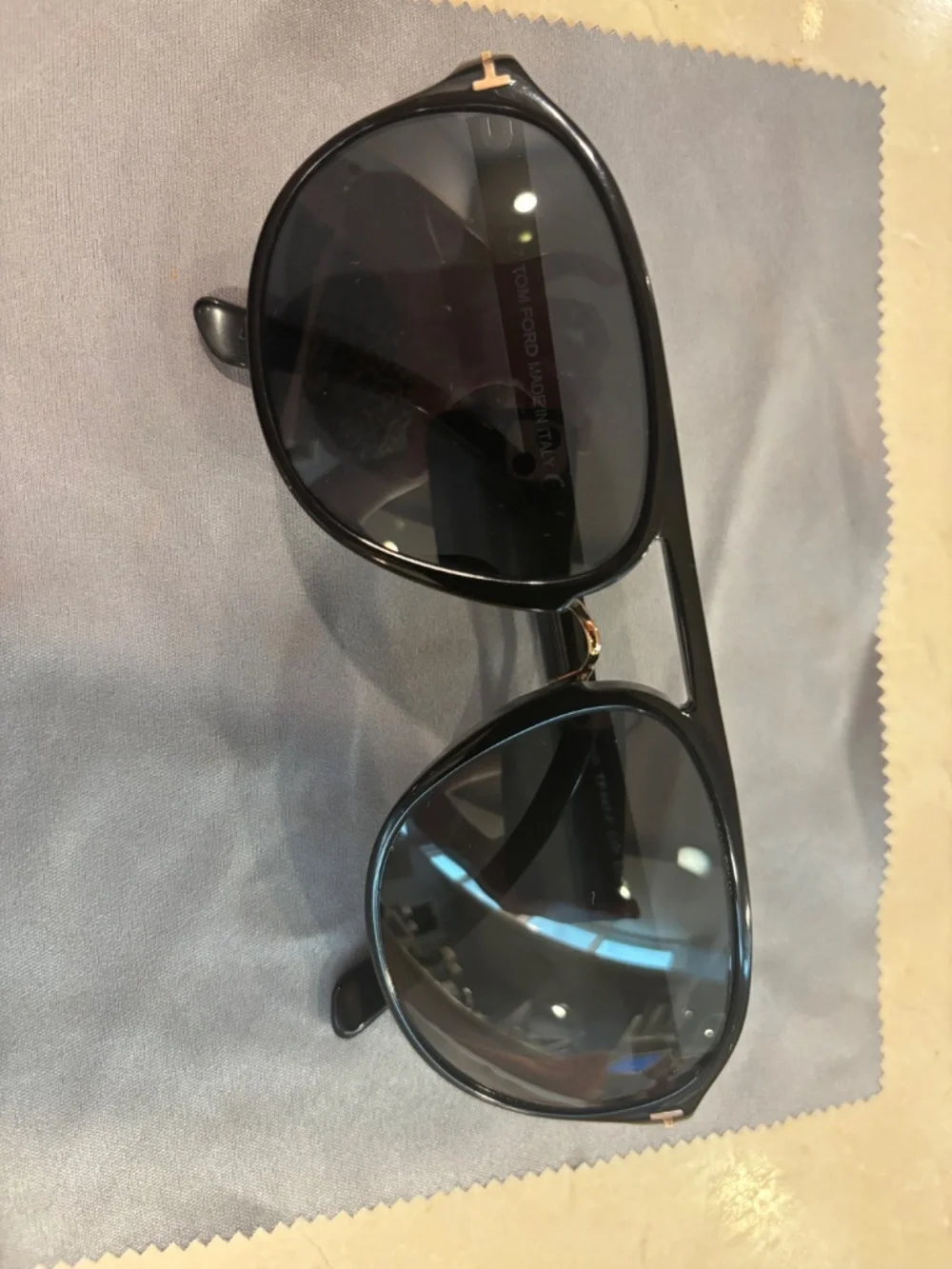 Lot of used Prada and Tom Ford glasses.